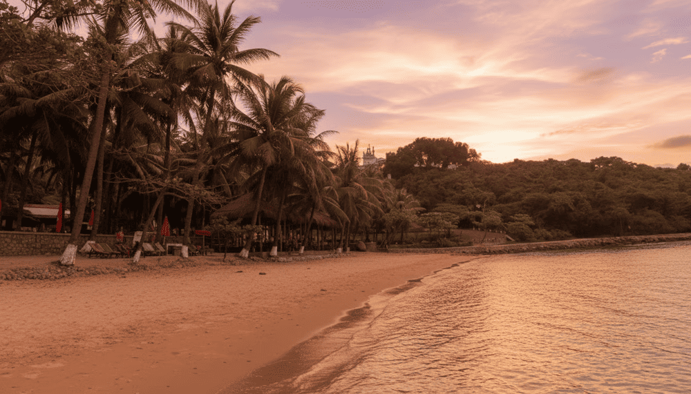 Visitors can soak up the sun and sea at Nha Trang Beach, where vibrant blue waters meet the laid-back charm of the coast